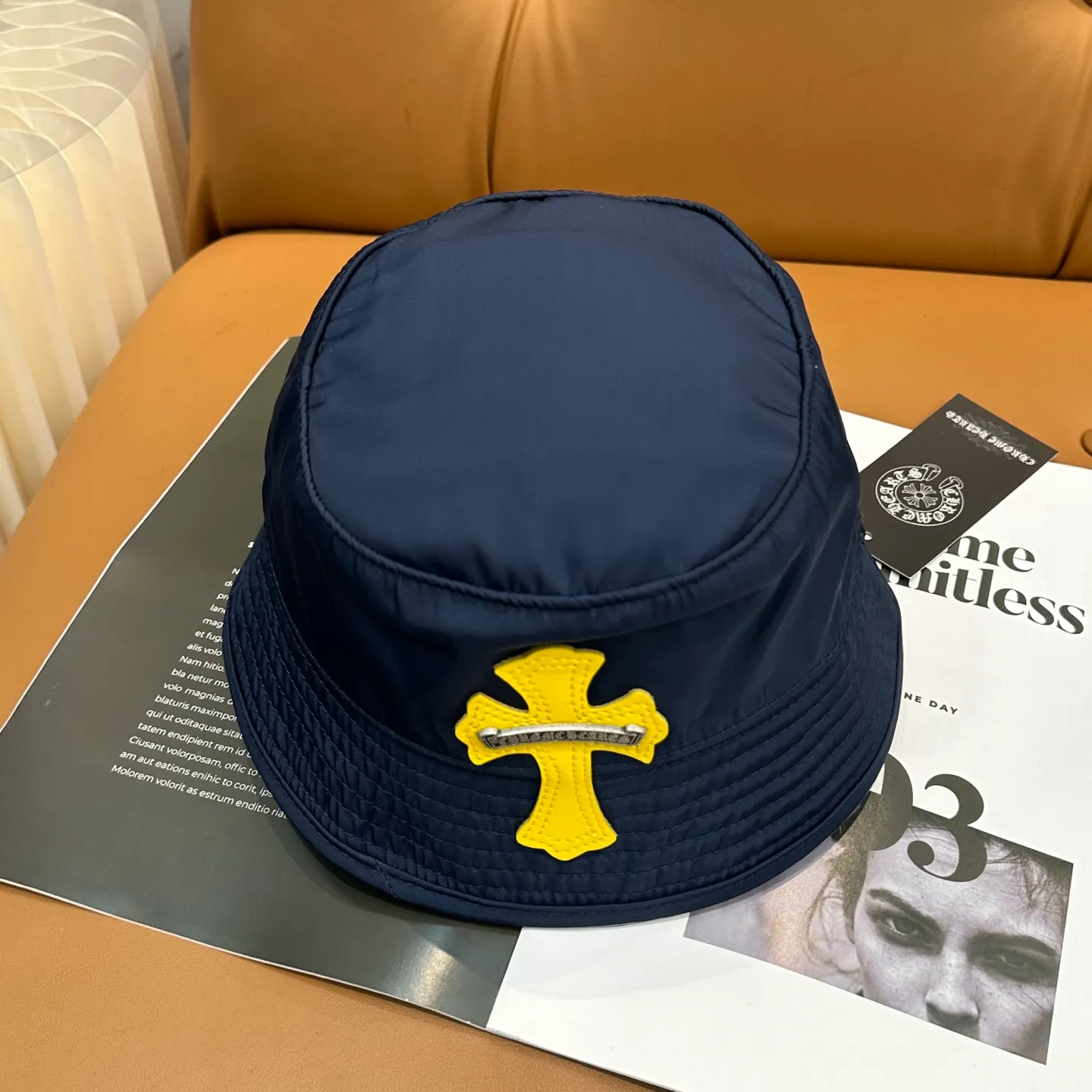 P70 Chrome Hearts CH Crank Bait Navy leather cross fisherman hat, same style for men and women. Custom-woven and dyed navy blue and yellow nylon fabrics, hand-cut imported colorless yellow crosses, and 925 silver scrolls.
